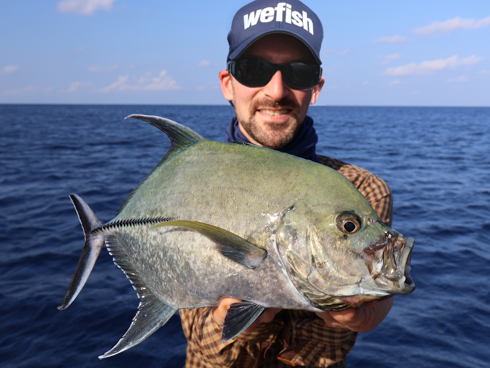 Black jack (Caranx lugubris) auf slow jig, Malediven